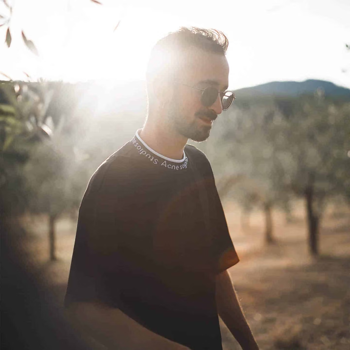 Pierre, your host, among olive trees in the evening light